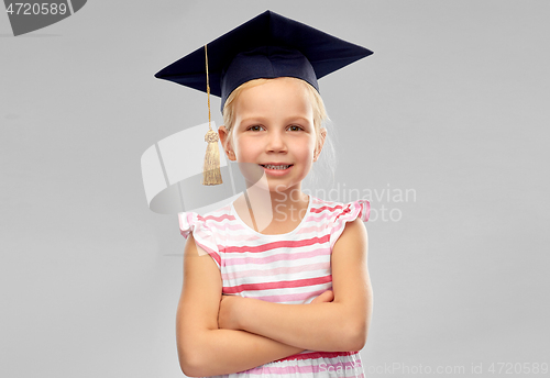 Image of happy girl in bachelor hat or mortarboard