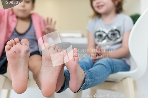 Image of cute little brother and sister at home