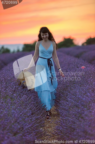 Image of woman portrait in lavender flower fiel