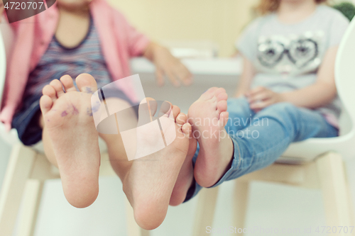 Image of cute little brother and sister at home