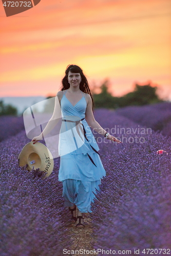 Image of woman portrait in lavender flower fiel