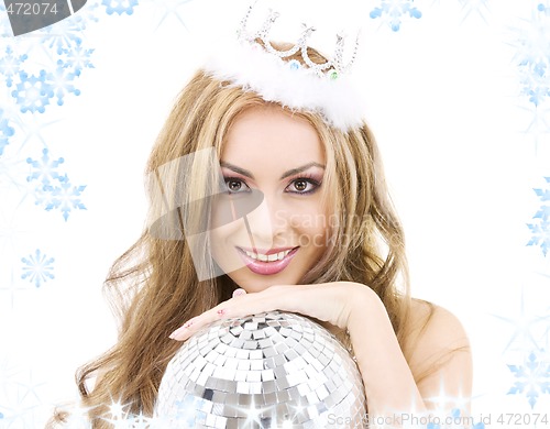 Image of lovely fairy in crown with disco ball