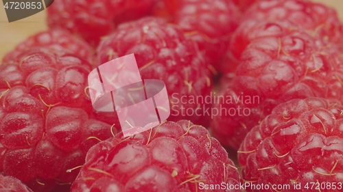 Image of Red raspberries in camera motion