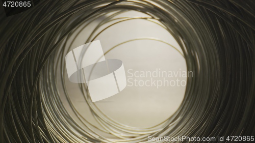 Image of Camera motion in round steel wired tunnel