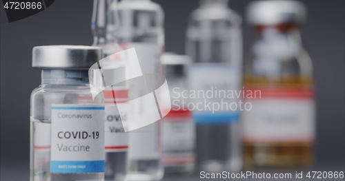 Image of Vaccine for lethatl virus in small bottles