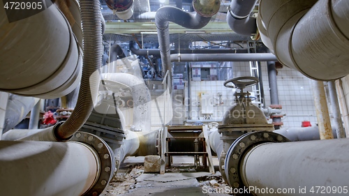 Image of Boiler room full of pipes sliding movement motion