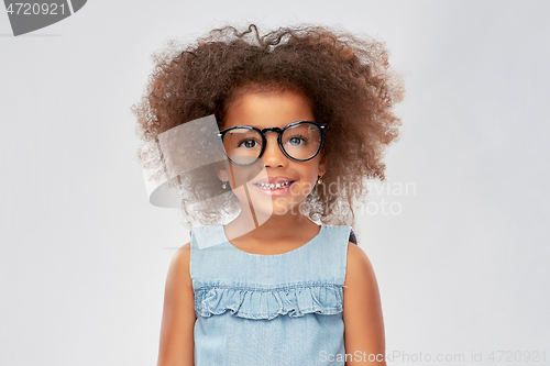Image of happy little african american girl in glasses