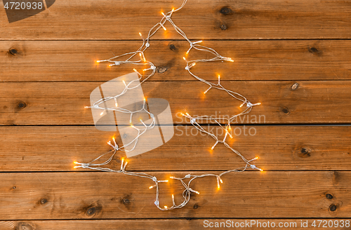 Image of garland lights string in shape of christmas tree