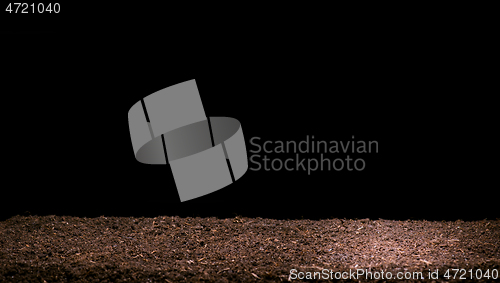 Image of Brown soil on black