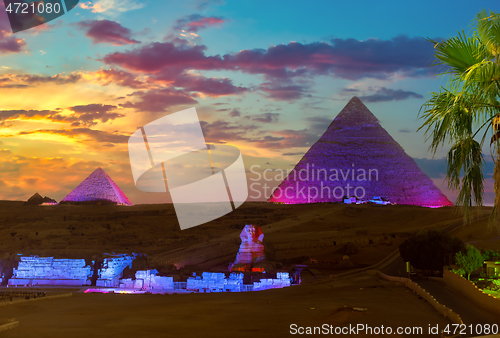Image of Pyramids in the night lights