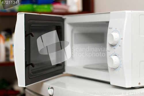 Image of Microwave oven open door