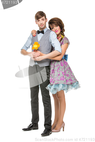 Image of boy and girl looking like dolls