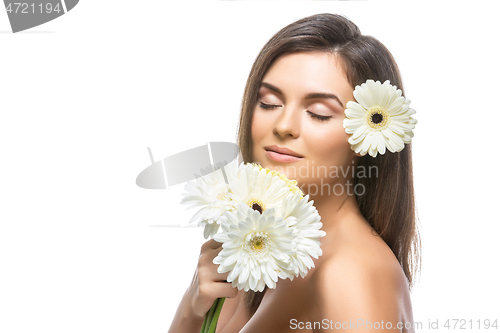 Image of beautiful girl with white flowers