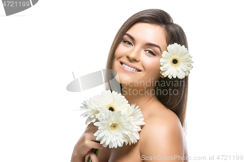 Image of beautiful girl with white flowers