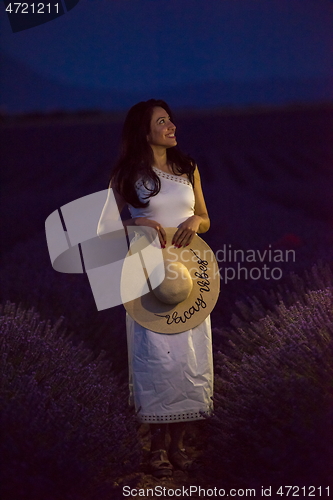 Image of woman portrait in lavender flower fiel