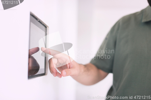 Image of smart home and technology concept close up of male hands