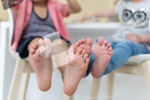 Image of cute little brother and sister at home