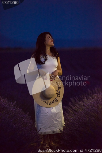 Image of woman portrait in lavender flower fiel