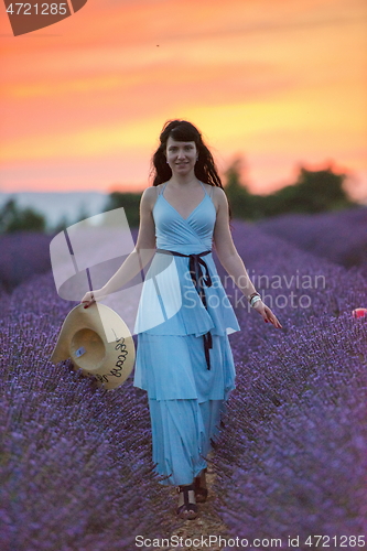 Image of woman portrait in lavender flower fiel