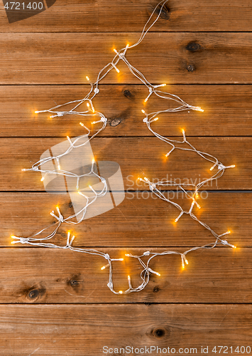 Image of garland lights string in shape of christmas tree