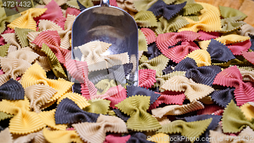 Image of Colored Farfalle Pasta bow tie pasta background.