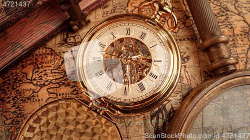 Image of Vintage pocket watch. Vintage background Concept of time history