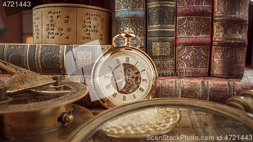 Image of Vintage pocket watch. Vintage background Concept of time history