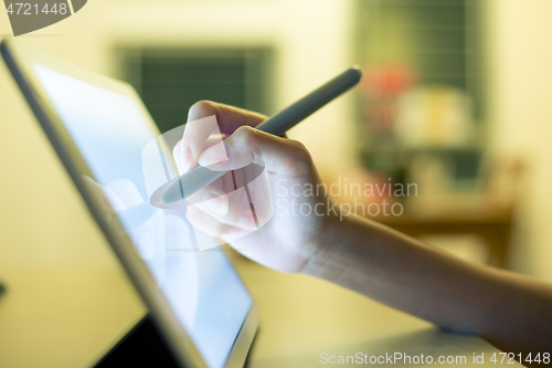 Image of Woman using tablet computer 