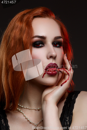 Image of Beautiful vampire young woman