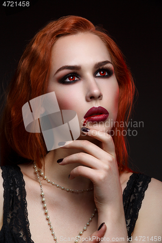 Image of Beautiful vampire young woman