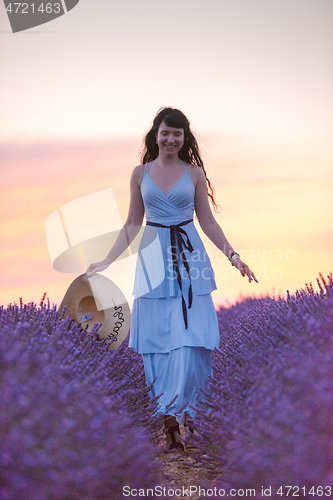 Image of woman portrait in lavender flower fiel