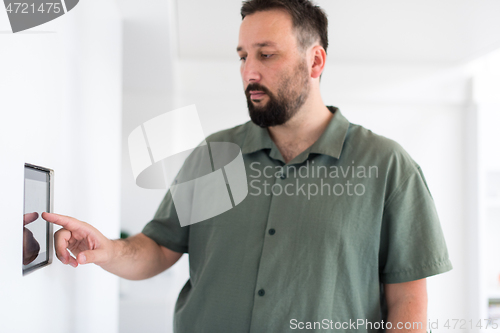 Image of smart home and technology concept close up of male hands