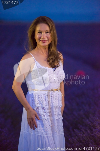 Image of portrait of and asian woman in lavender flower field