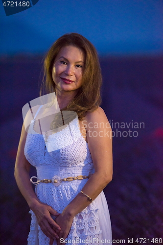 Image of portrait of and asian woman in lavender flower field