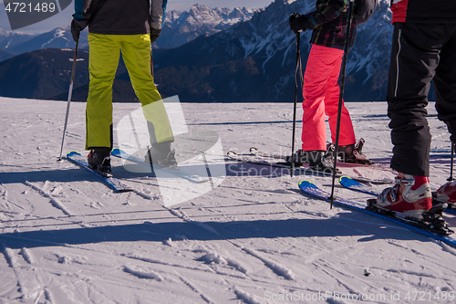 Image of group of happy people having fun on snow