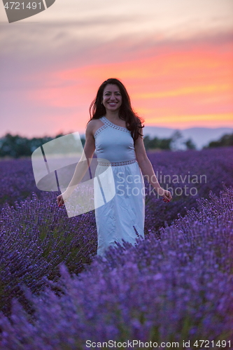 Image of woman portrait in lavender flower fiel