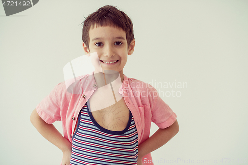 Image of lilittle boy looking at heart love symbol sketched on his chest