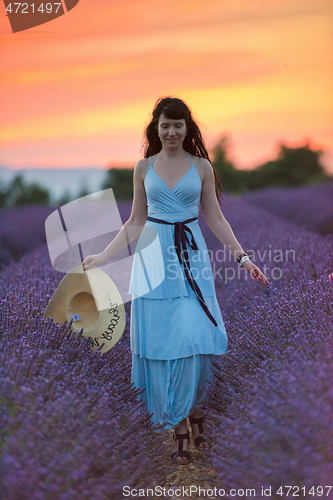 Image of woman portrait in lavender flower fiel