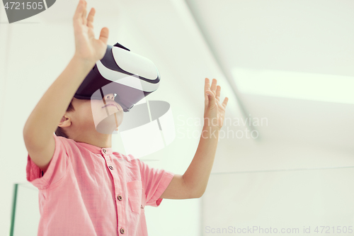 Image of kid at home wearing vr glasses