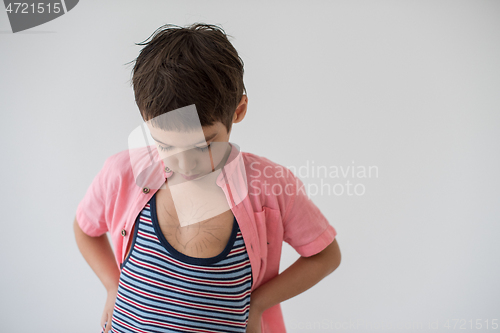 Image of lilittle boy looking at heart love symbol sketched on his chest