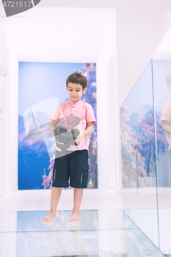 Image of kid at home wearing vr glasses