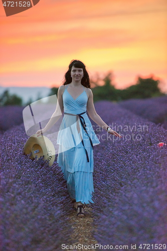 Image of woman portrait in lavender flower fiel