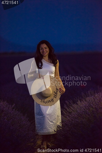 Image of woman portrait in lavender flower fiel