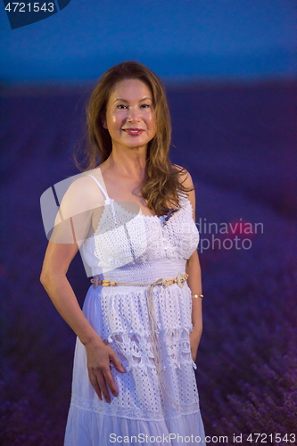 Image of portrait of and asian woman in lavender flower field