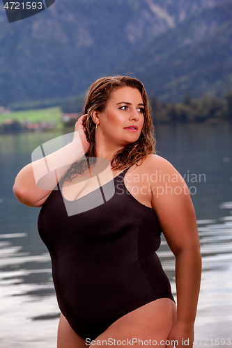 Image of Beautiful chubby woman in a swimsuit