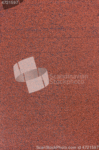 Image of Background - roll tiles covered with red stone chips