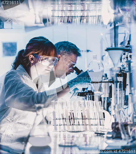 Image of Health care researchers working in scientific laboratory.