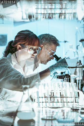 Image of Health care researchers working in scientific laboratory.