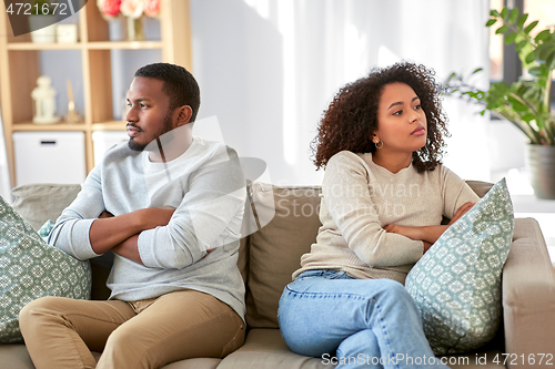 Image of unhappy couple having argument at home