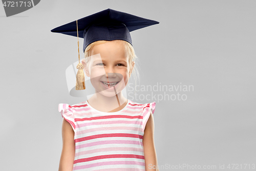 Image of happy girl in bachelor hat or mortarboard